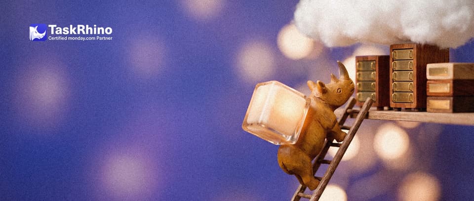 A small wooden rhino carries a small glowing glass cube up a wooden ladder onto a shelf of stacked miniature wooden and brass server racks under a soft cotton cloud.