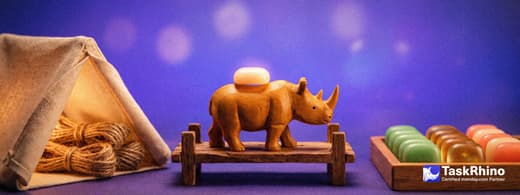 A small wooden rhino carries items from a little canvas tent with neat bundles of twine inside into a tidy board of coloured tiles, nothing dropped on the way.