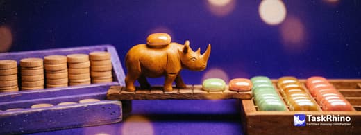 A small wooden rhino carries items from a violet wooden rack of small stacked counters into a tidy board of coloured tiles, nothing dropped on the way.