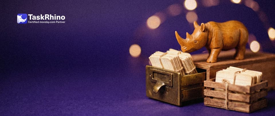 A small wooden rhino unloads neat bundles of index cards from a heavy brass cabinet drawer into small wooden crates tied with string.