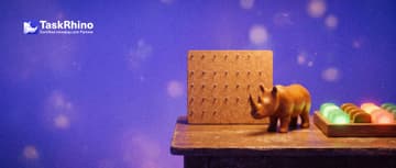 A small wooden rhino stands between two tiny wooden doors standing open: through one a simple paper wall planner, through the other a tidy board of coloured tiles.