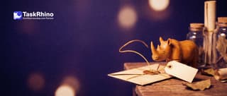 A small wooden rhino ties a small blank return tag to a letter; a golden thread curves from the letter back to the rhino like a boomerang.