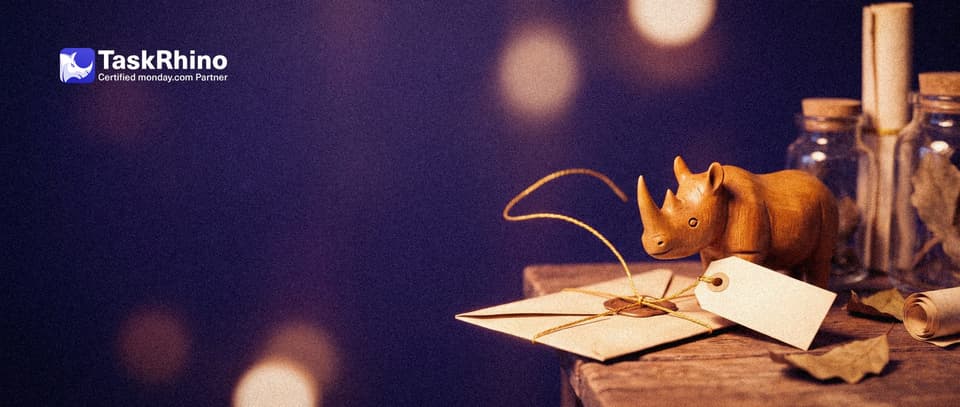 A small wooden rhino ties a small blank return tag to a letter; a golden thread curves from the letter back to the rhino like a boomerang.