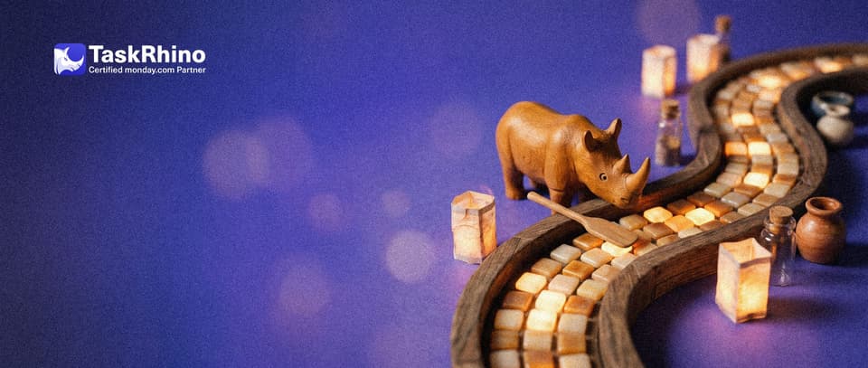 A small wooden rhino guides a smooth stream of glowing tiles along a gently curving wooden track like a little river.